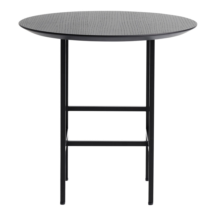Round black table with a textured surface and sleek black legs, perfect for modern decor.