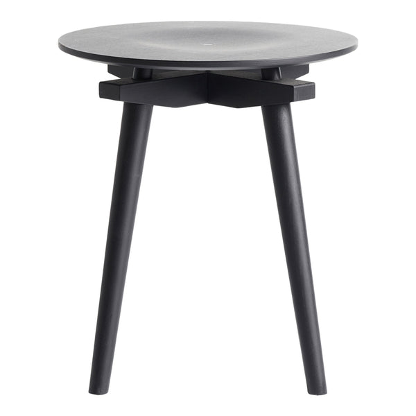 Black round side table with a smooth top and contrasting geometric legs. Elegant modern design for any decor.