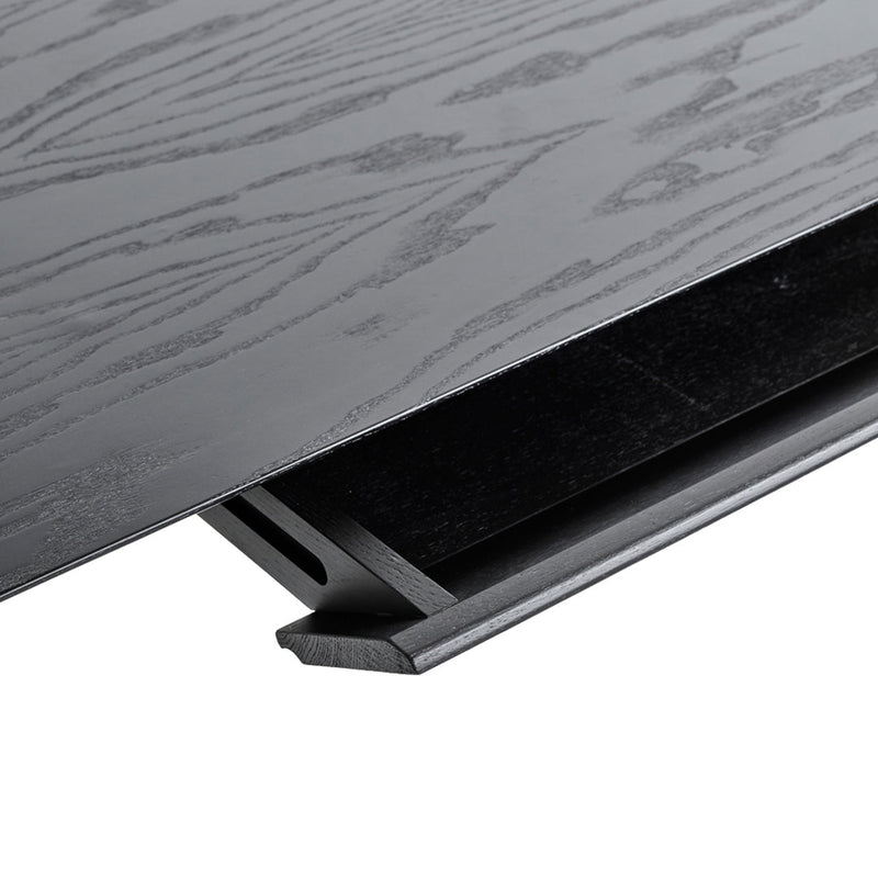 Black wood grain texture with a matte finish, highlighting a sleek design and subtle, modern patterns.