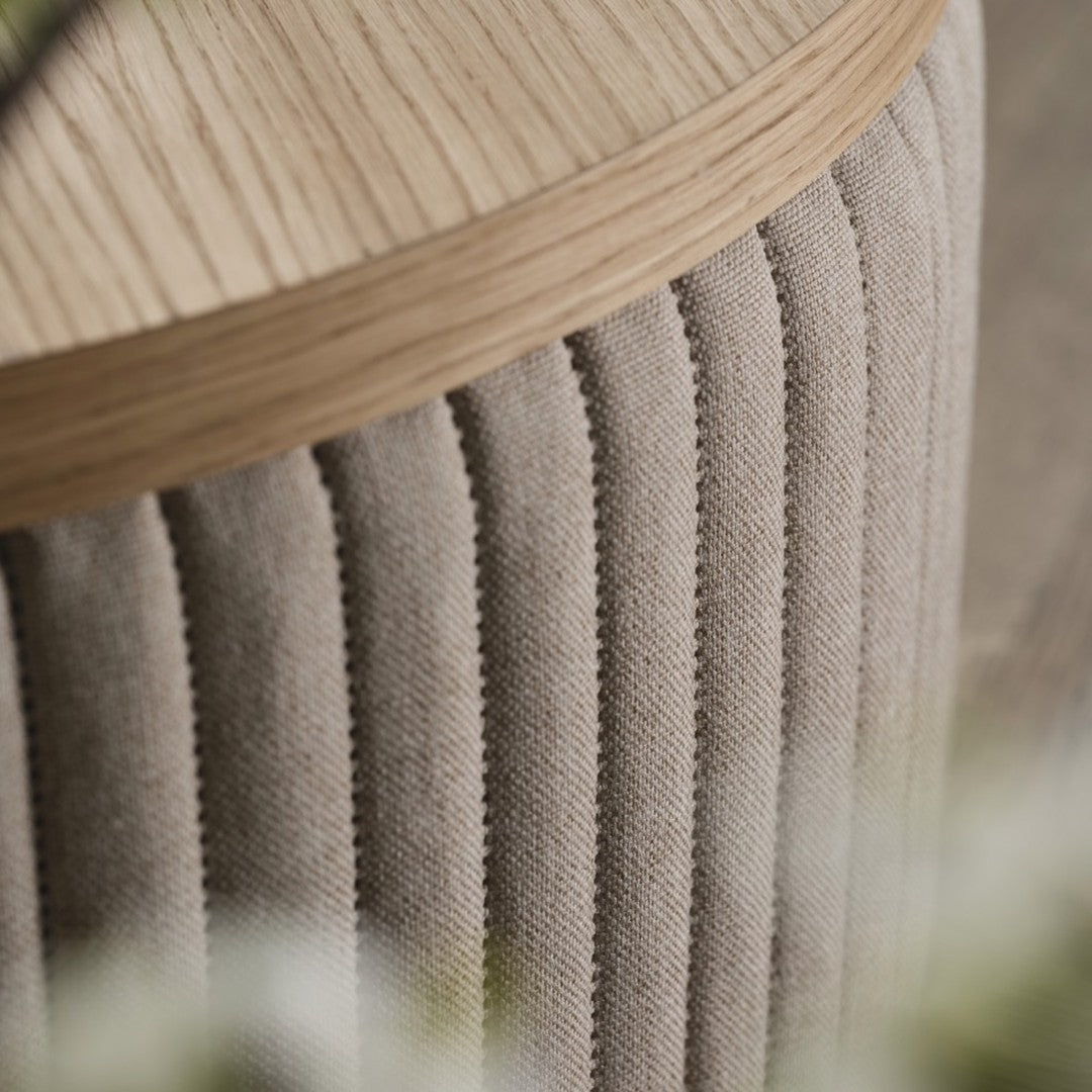 Light beige corduroy texture with vertical ribbing, topped with a natural wood surface.