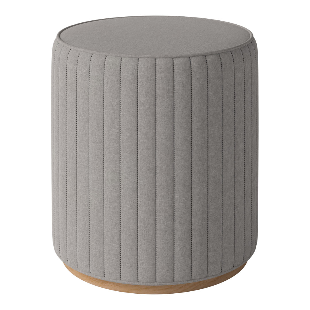 Gray textured round stool with vertical ribbed pattern and wooden base.