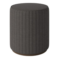Gray ribbed upholstered ottoman with a rounded top and wooden base. Modern and stylish accent for any decor.