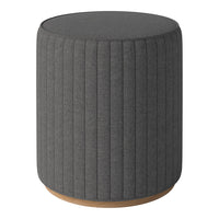 Gray ribbed fabric ottoman with a light wood base, adding a modern touch to any space.