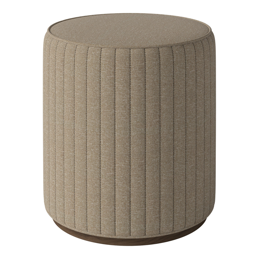 Beige upholstered stool with vertical ribbed pattern and circular wooden base. Ideal for modern decor.