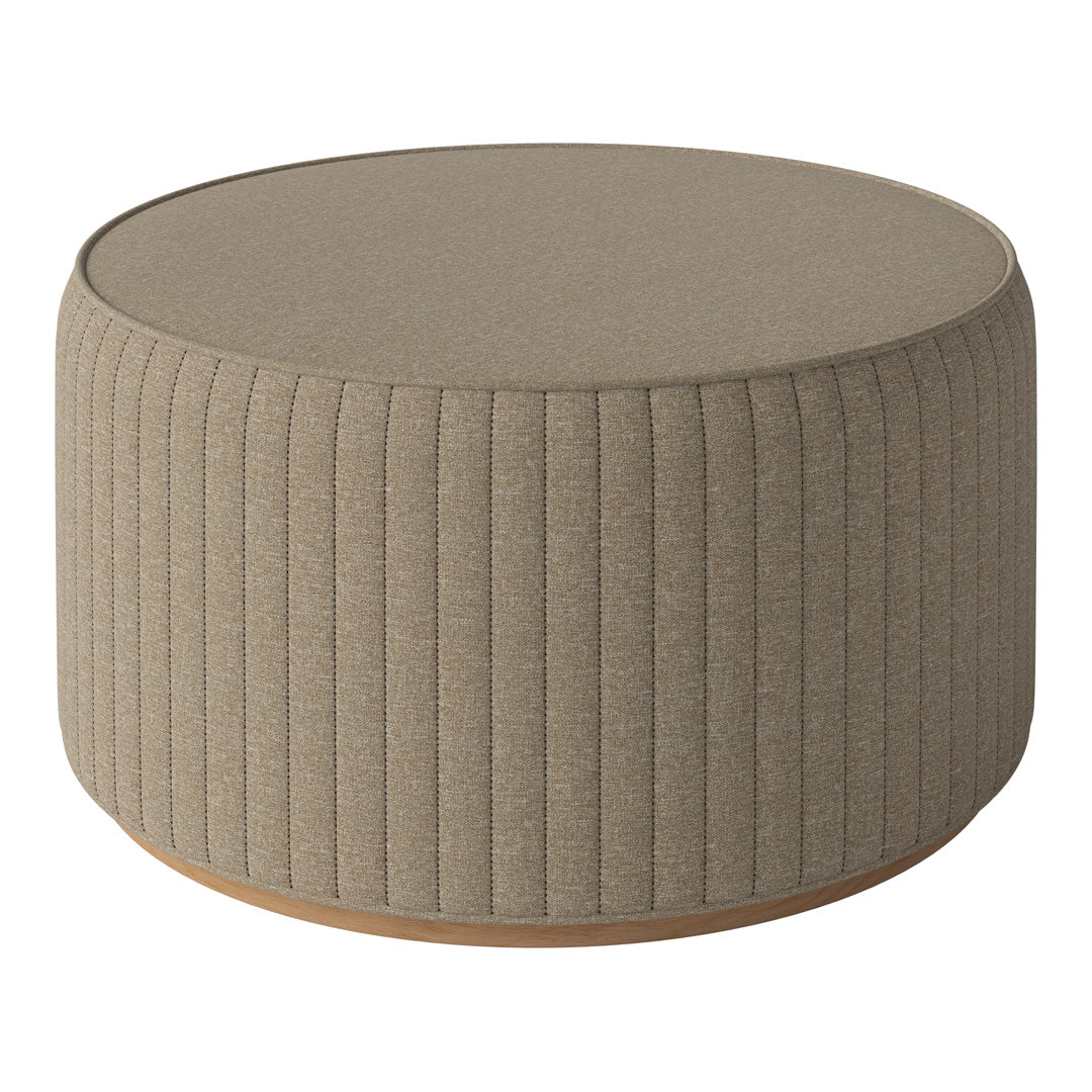 Round, beige ottoman with a ribbed texture and smooth top, featuring a wooden base.