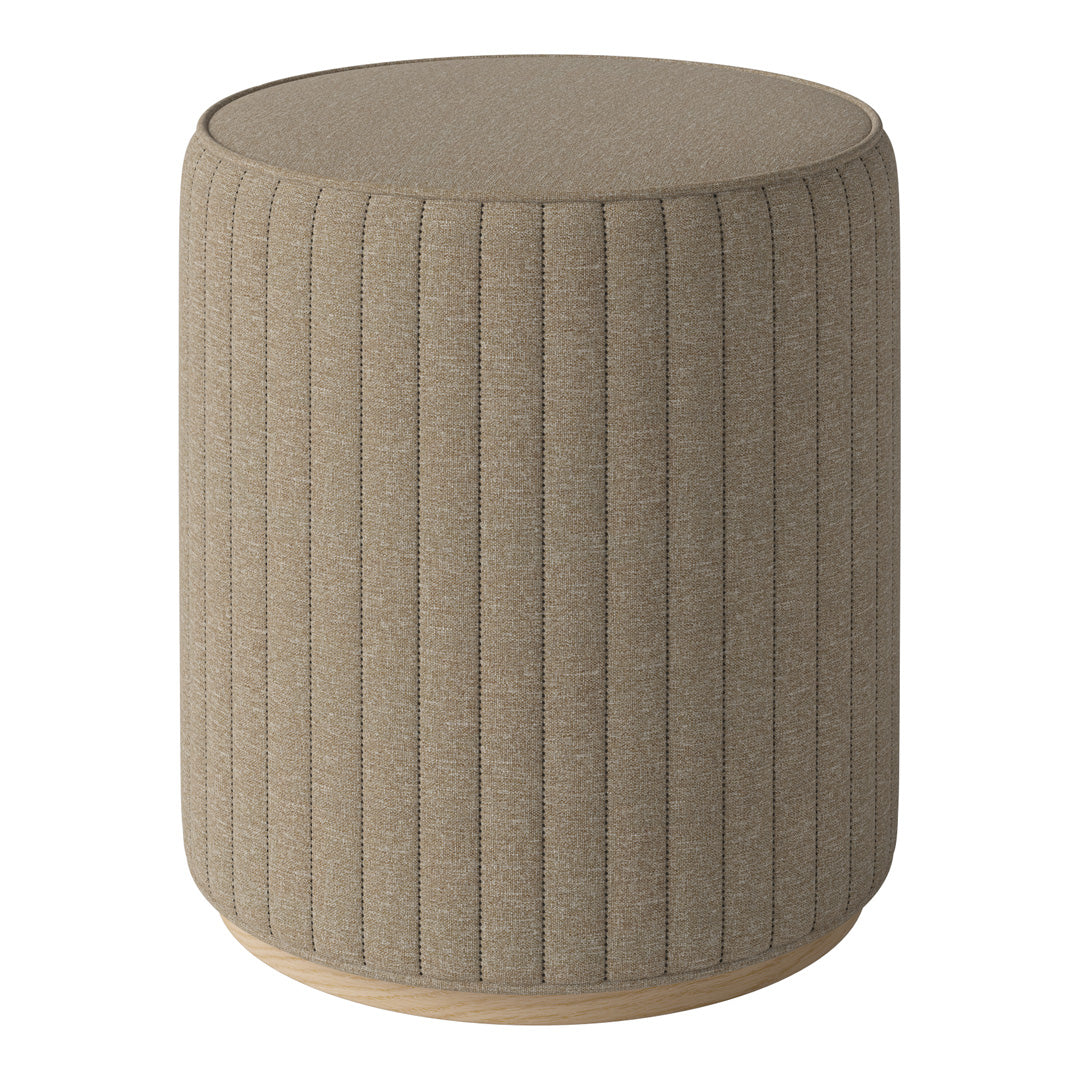 Beige upholstered accent stool with vertical ribbed texture and a natural wood base. Perfect for modern decor.