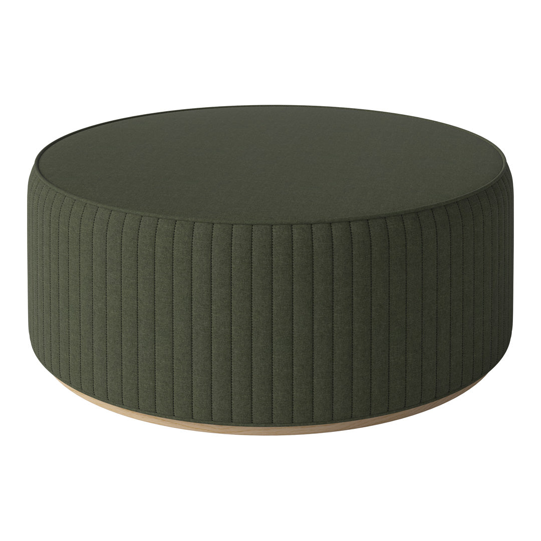 Round olive green ottoman with vertical ribbed fabric and a light wooden base. Ideal for modern decor.