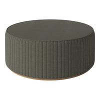 Round ottoman in muted olive green with vertical ribbed pattern and natural wooden base. Modern, stylish design.