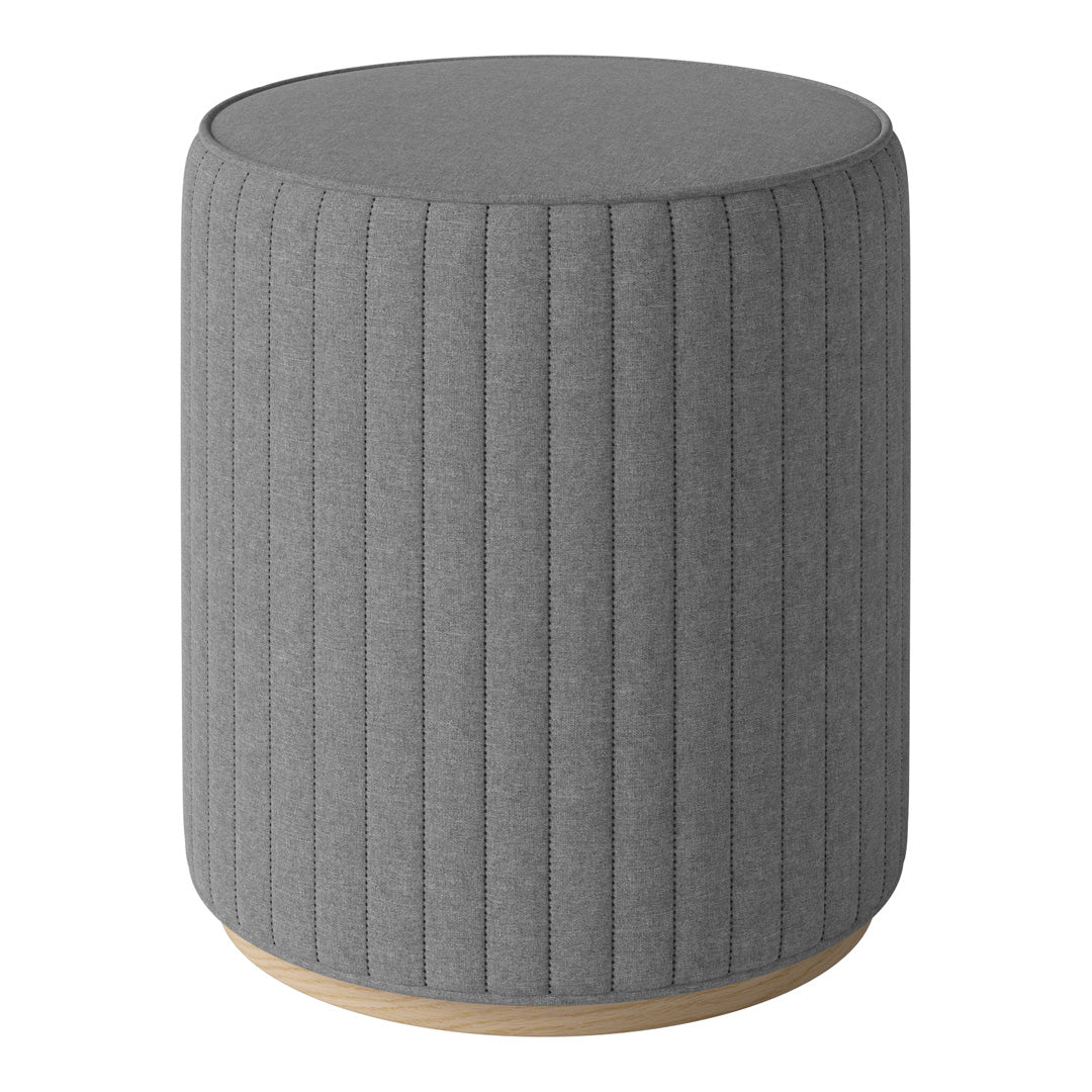 Gray upholstered round stool with vertical ribbed pattern and a natural wood base. Perfect for modern decor.