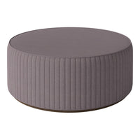 Round purple ottoman with ribbed texture and a wooden base, ideal for modern decor.