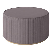 Round gray upholstered ottoman with vertical ribbed pattern and wooden base. Ideal for modern decor.