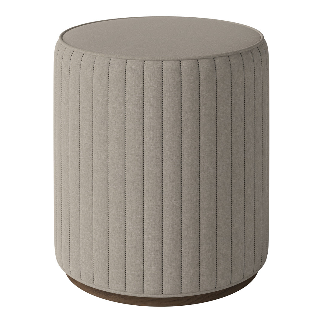 Beige textured fabric stool with vertical ribbed pattern and a round wood base. Modern design for versatile decor.