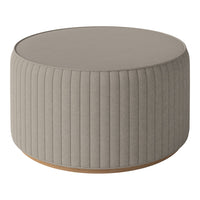 Light gray round ottoman with vertical ribbed texture and wooden base. Ideal for modern home decor.