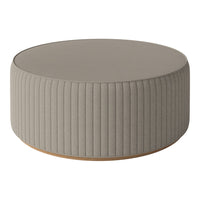 Round gray ottoman with vertical ribbed pattern and a wooden base, perfect for modern living spaces.