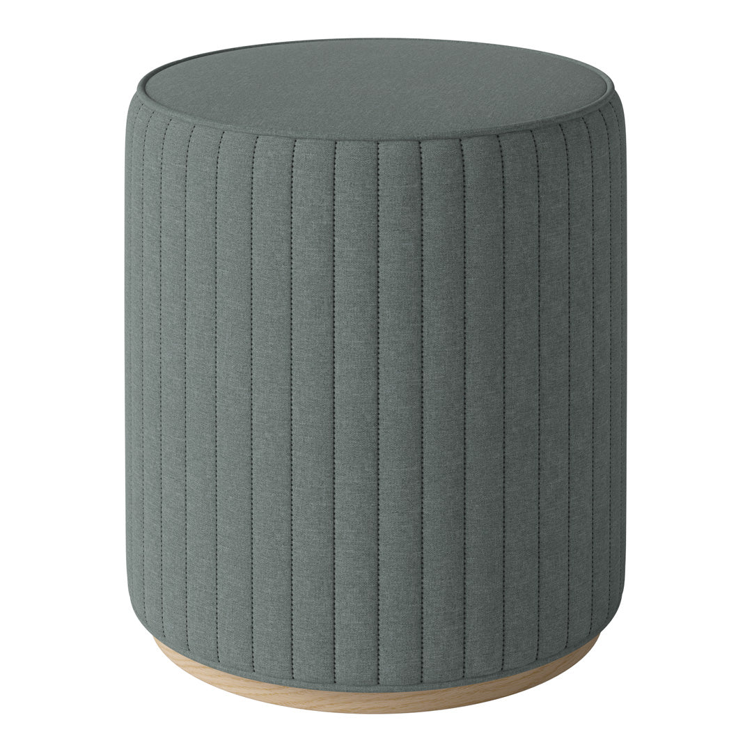 Gray ribbed fabric ottoman with a natural wood base, adding texture and elegance to any space.
