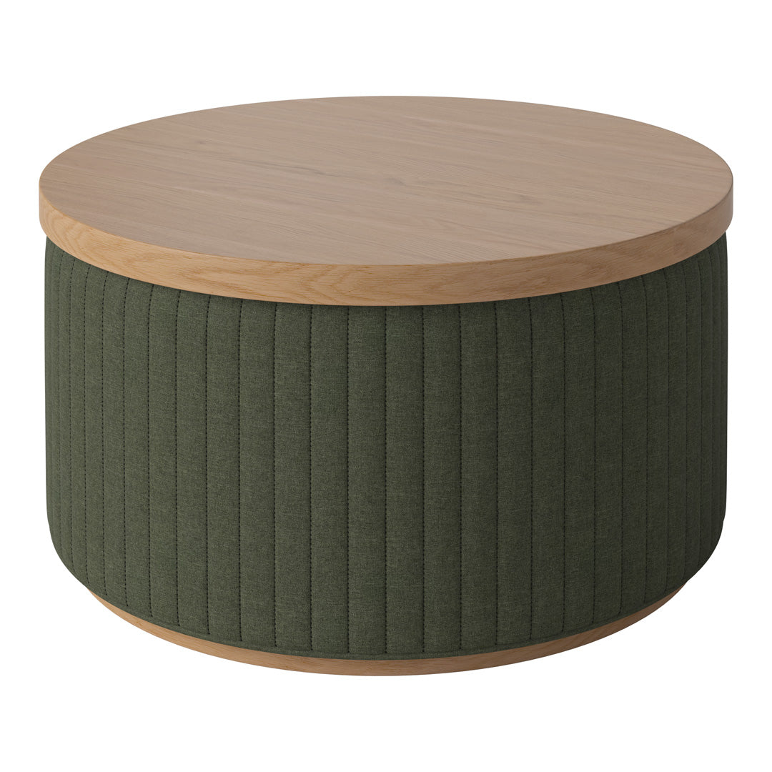 Round coffee table with a light wood top and dark green ribbed fabric base. Modern and stylish design elements.