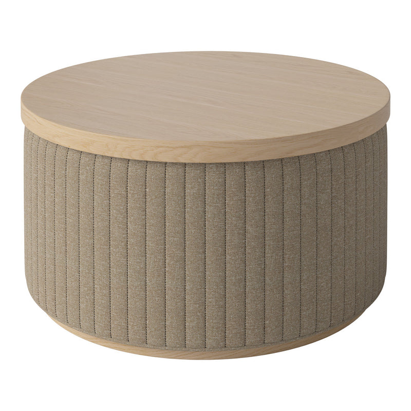 Round coffee table with a natural wood top and textured beige ribbed fabric sides. Elegant and modern design.