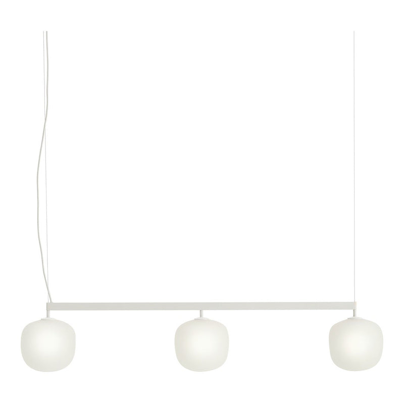White pendant light with three frosted glass globes and a minimalist design. Ideal for modern decor.