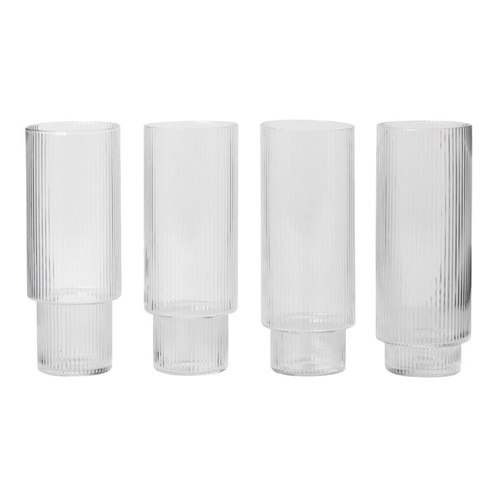 Set of four clear glass tumblers with ribbed and smooth patterns. Modern, minimalist design perfect for any occasion.