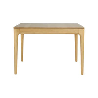 Light oak table with a smooth finish and minimalist design, featuring natural wood grain patterns.