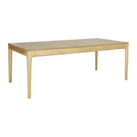 Natural wood finish dining table with smooth, light beige surface and sleek, minimalist design.