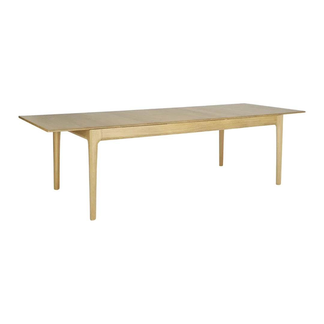 Light oak dining table with a smooth, natural finish and minimalist design, perfect for modern interiors.