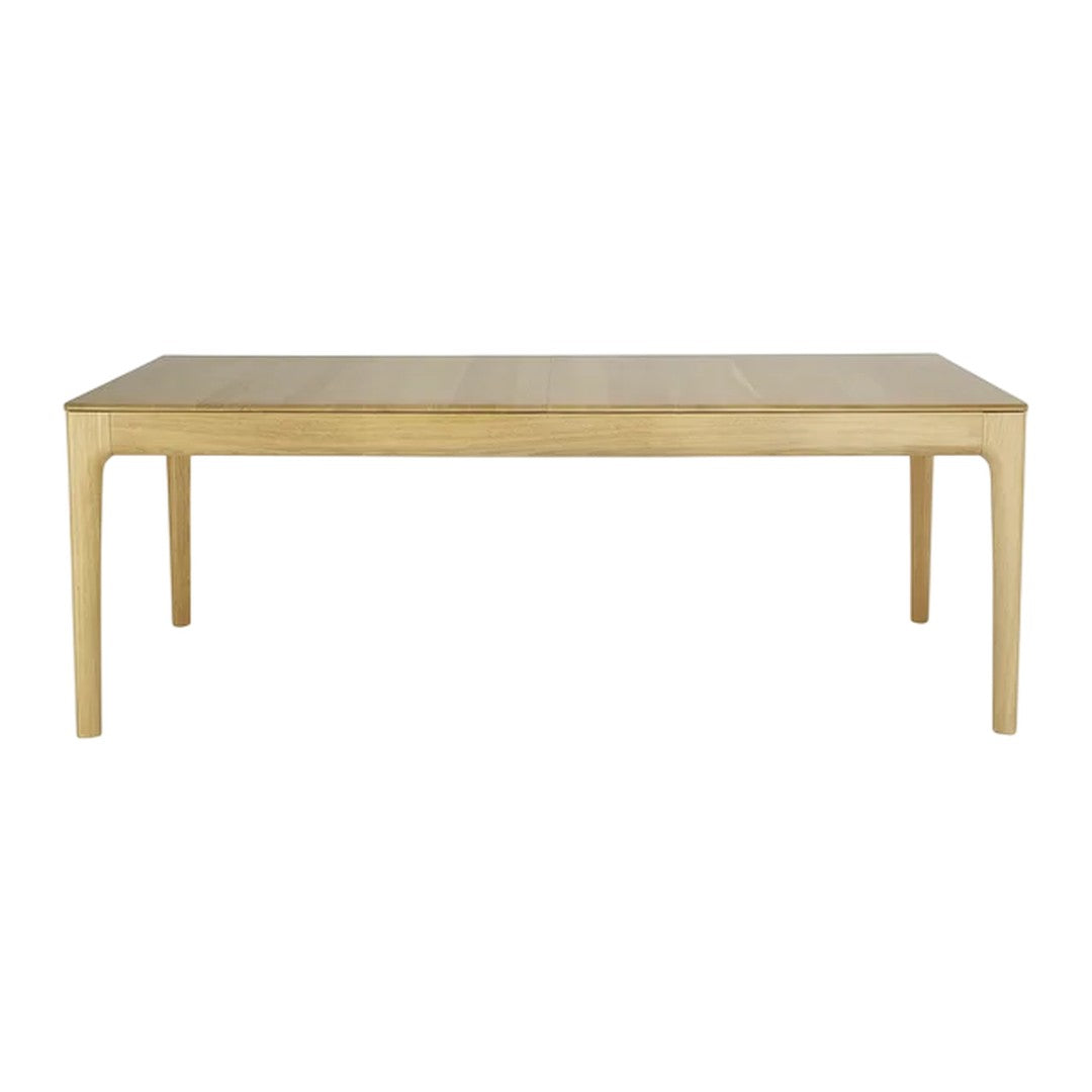 Light oak dining table with a smooth, minimalistic surface and soft, rounded edges. Elegant natural wood finish.