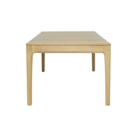 Light natural wood dining table with a smooth, matte finish and clean, simple lines. Perfect for modern decor.