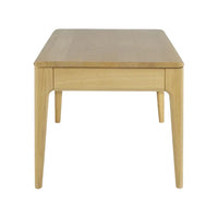 Light oak wood coffee table with a smooth, natural finish and clean lines. Contemporary design with sleek legs.