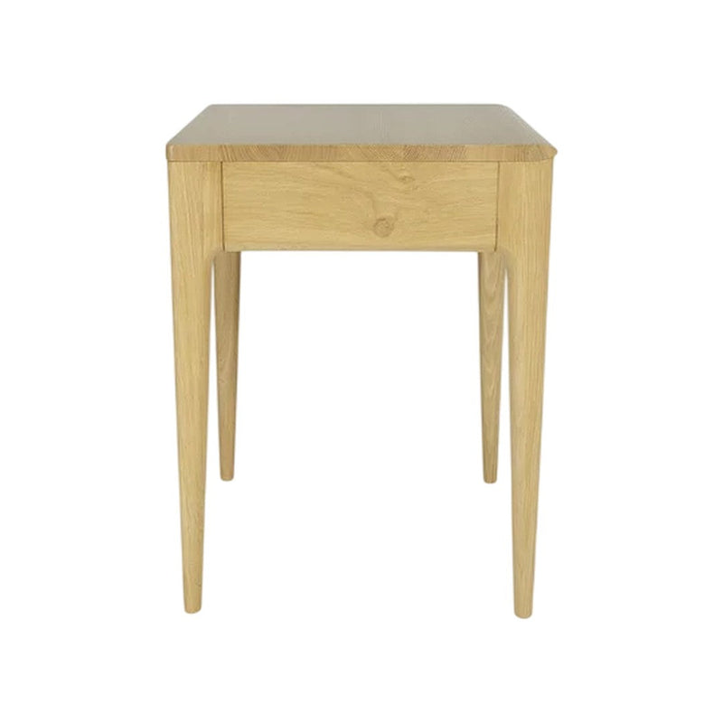 Light oak bedside table with a smooth finish and natural wood grain pattern, featuring tapered legs and a minimalist design.