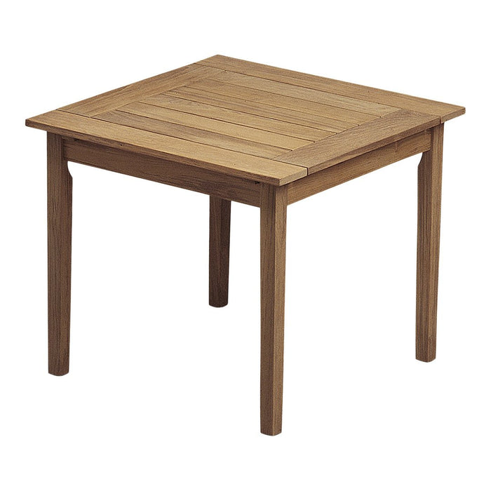 Square wooden table with a natural light brown finish and a smooth, slatted pattern on the top.