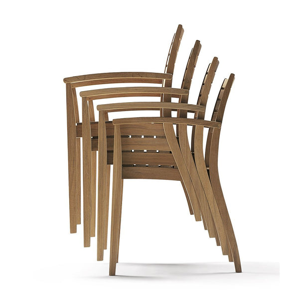 Stacked wooden chairs featuring a warm brown finish and smooth, linear slats. Perfect for modern outdoor decor.