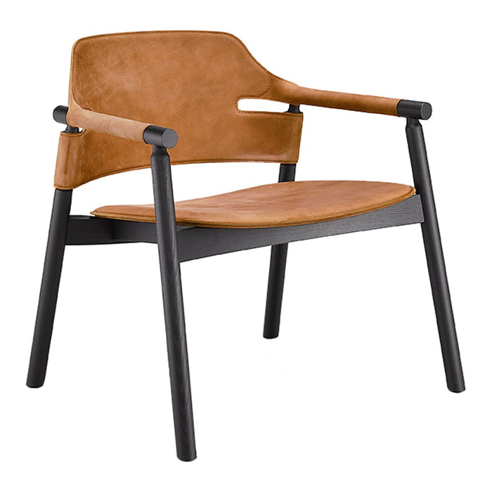Brown leather chair with sleek black legs and minimalistic design. Perfect blend of modern and rustic style.