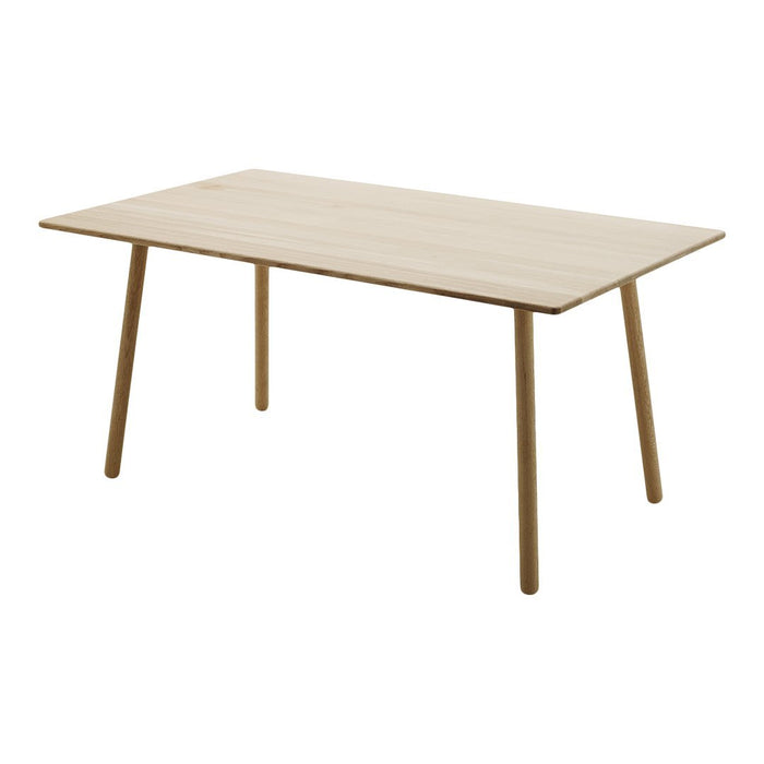 Light wood dining table with a smooth, natural finish and minimalist design. Perfect for modern home decor.