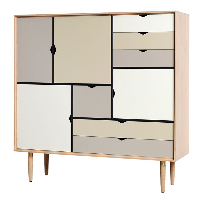 Modern cabinet featuring a mix of beige, white, and black patterns with geometric drawer designs. Perfect for any decor.
