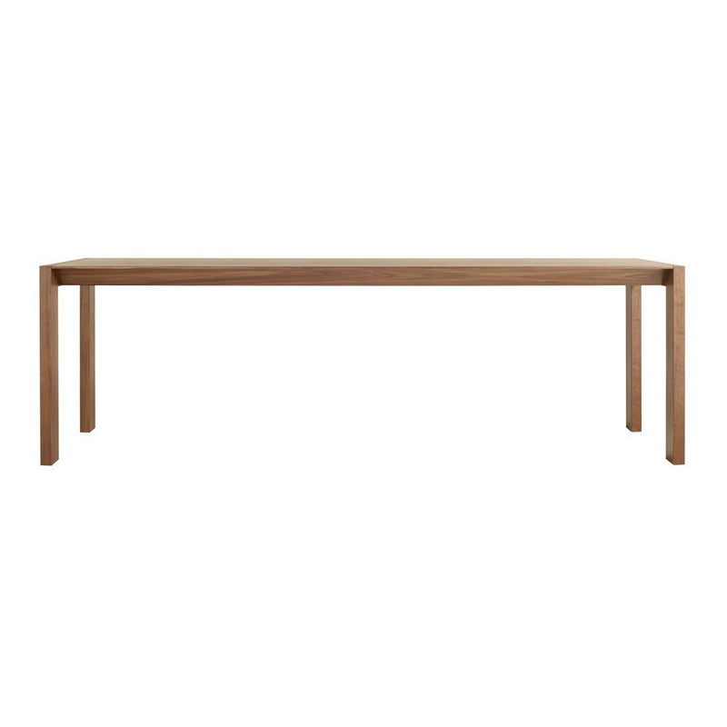 Natural wood dining table with a warm brown finish and sleek, minimalist design. No visible patterns.