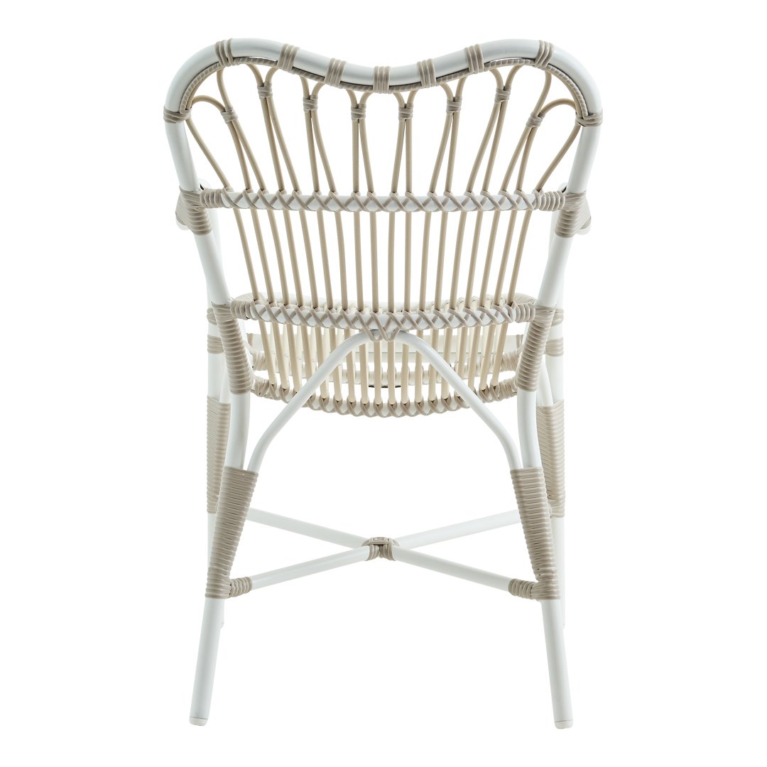 White rattan chair with a light beige woven pattern, showcasing a stylish, contemporary design.