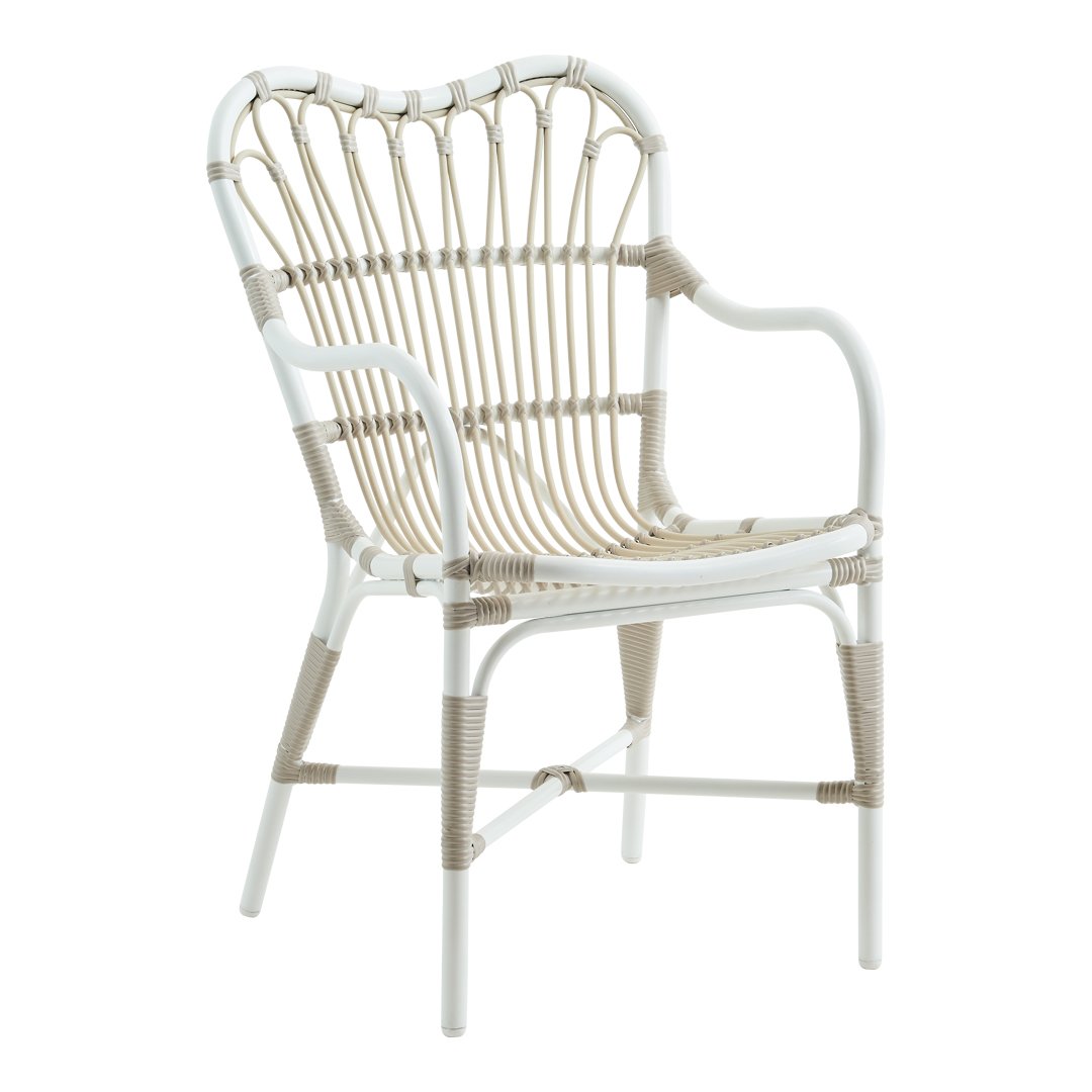 White and beige rattan chair with a woven pattern, featuring a stylish heart-shaped backrest.