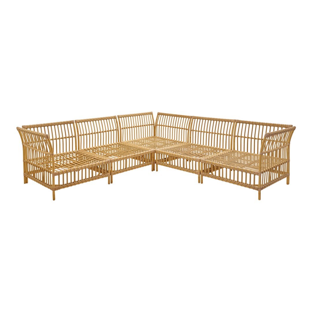 Natural rattan sectional sofa in a warm beige tone with a vintage-inspired woven pattern. Perfect for cozy spaces.
