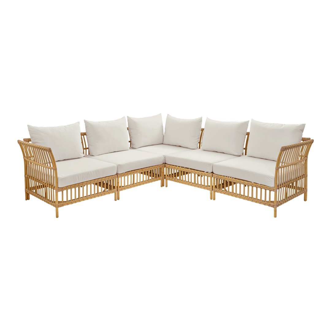 Beige cushioned corner sofa with a natural wood frame and minimalist design. Perfect for outdoor or indoor settings.