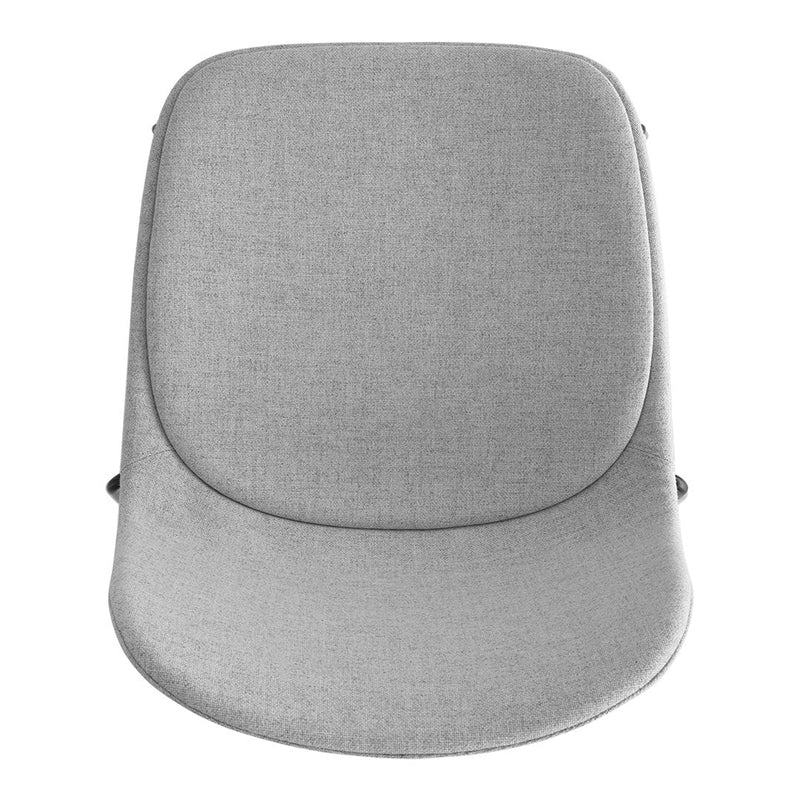Gray upholstered chair with a smooth, minimalistic design and subtle texture pattern, ideal for modern interiors.