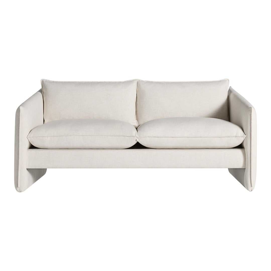 Light beige sofa with a smooth, minimalist design and plush cushion patterns for modern interiors.
