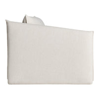 Beige upholstered sofa with a soft, textured finish, featuring a minimalist design. Perfect for modern interiors.