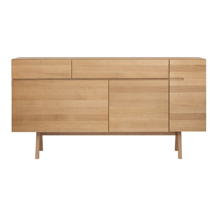 Natural light oak wood sideboard with clean lines and a minimalist design, featuring a smooth, unadorned surface.