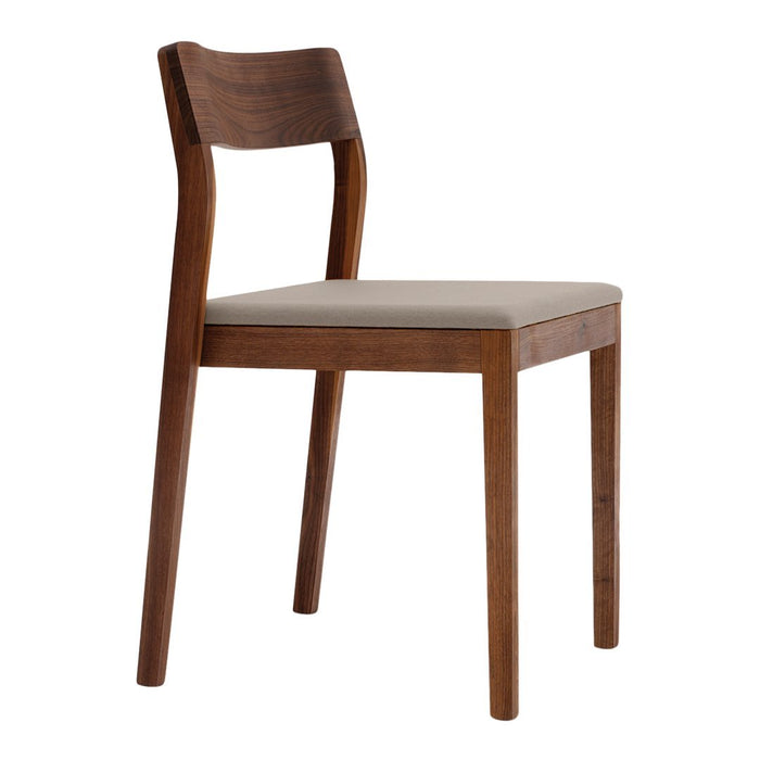 Solid walnut dining chair with a smooth cream fabric seat, showcasing a sleek, modern design. Perfect for any decor.