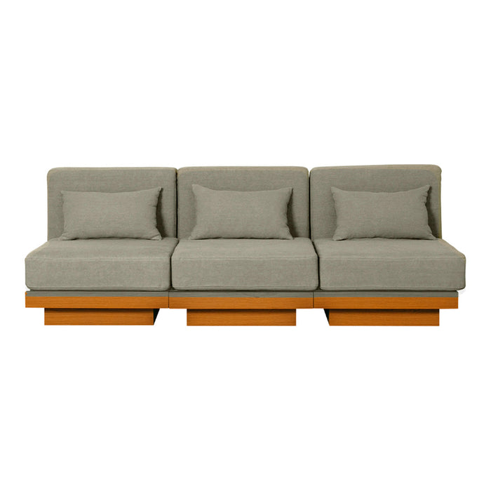 Gray fabric sofa with three cushions, featuring a sleek wooden base. Modern design with minimalist style.