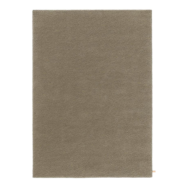 Soft taupe area rug with a plush texture, featuring a solid, minimalist design for versatile home decor.