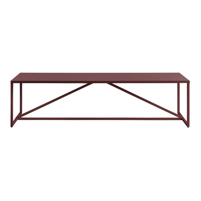 Rust-colored metal coffee table with a minimalist design and geometric pattern on the base. Perfect for modern decor.