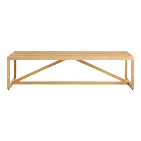 Light natural wood coffee table with a simple, sleek design and cross-patterned support structure.