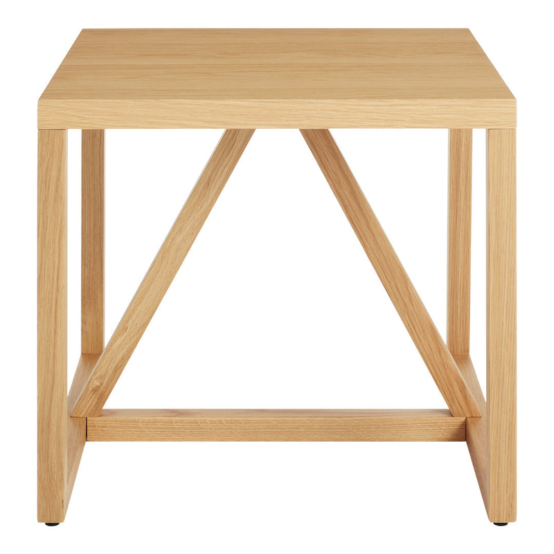 Natural light wood side table with minimalist design and triangular leg pattern, perfect for modern decor.